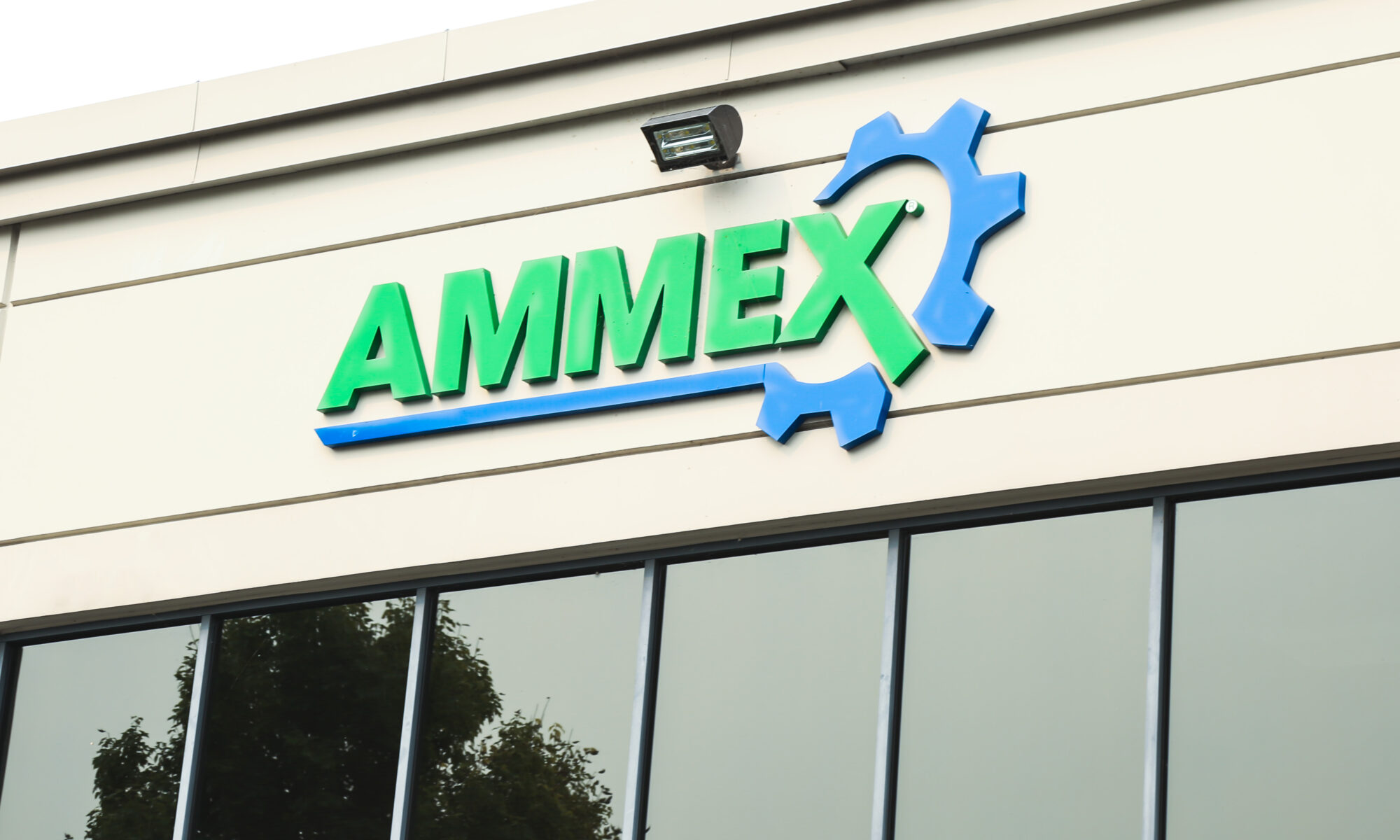 AMMEX sign on front of office building