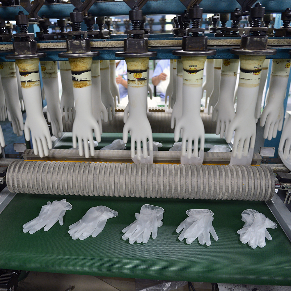 Formers in a disposable glove factory.